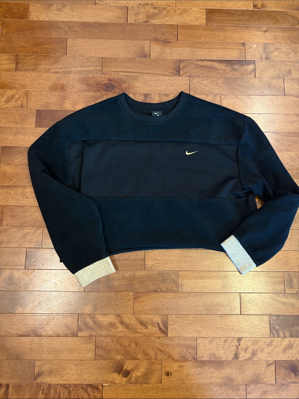 Nike Women's Black Crewneck Sweater with Metallic Cuff Detail